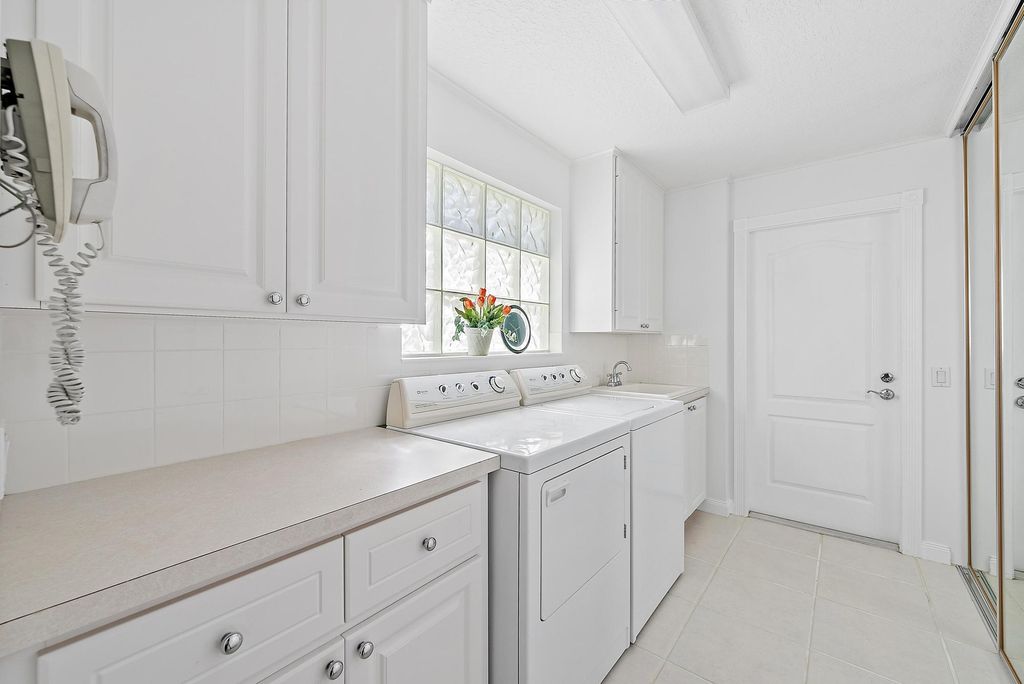 Photo of 699 Hudson Bay Drive, Palm Beach Gardens, FL 33410 (MLS # R11164049)