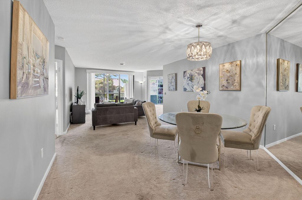 Photo of 5155 Europa Drive #M, Boynton Beach, FL 33437 (MLS # B26021031)