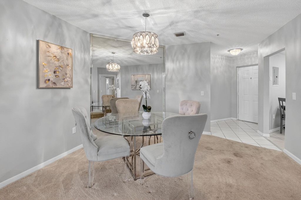 Photo of 5155 Europa Drive #M, Boynton Beach, FL 33437 (MLS # B26021031)