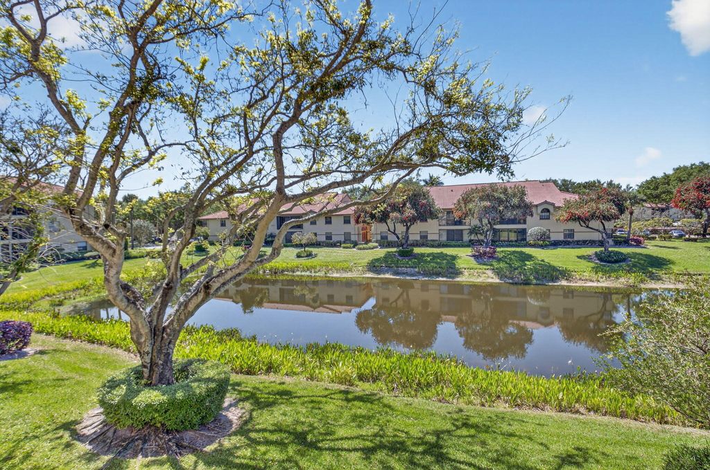 Photo of 5155 Europa Drive #M, Boynton Beach, FL 33437 (MLS # B26021031)