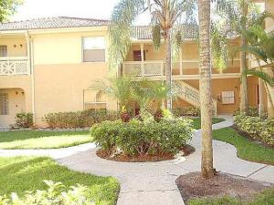 Equal Housing Opportunity. Spacious one bedroom, on bath first floor unit with lake view. All tile, open floor plan. Large walk in closet, full bath with roman tub. Large screened patio overlooking the lake. All appliances including washer and dryer.