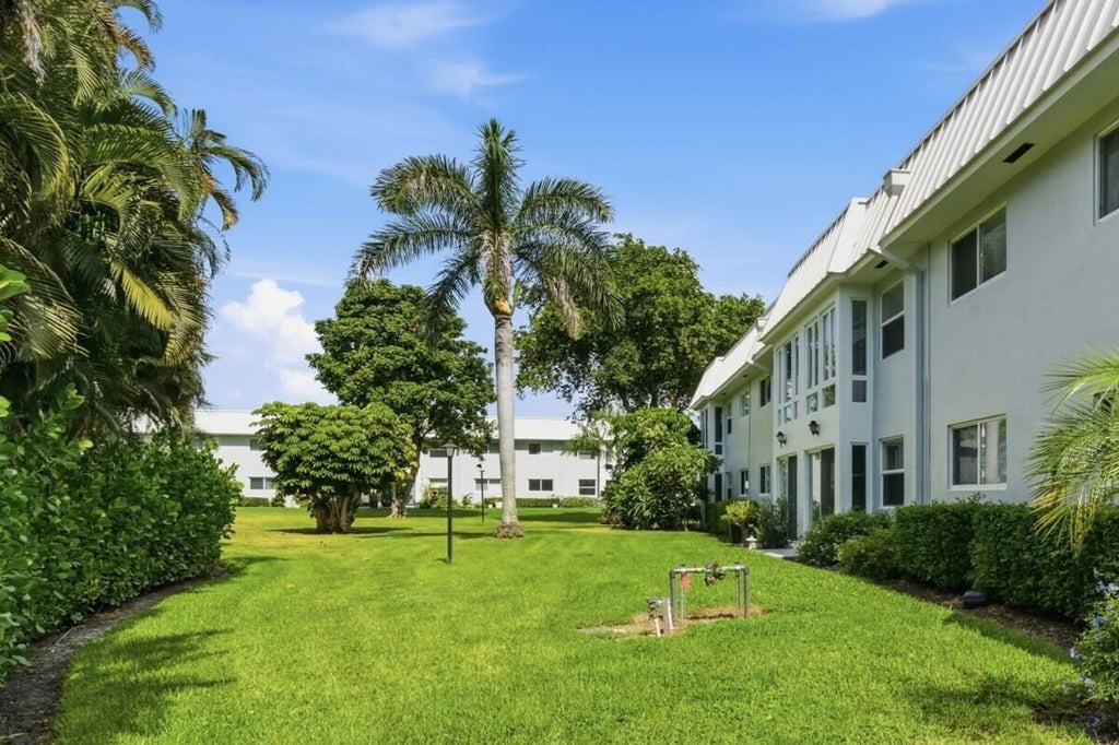 Photo of 20 COLONIAL CLUB Drive #202, Boynton Beach, FL 33435 (MLS # B26087464)