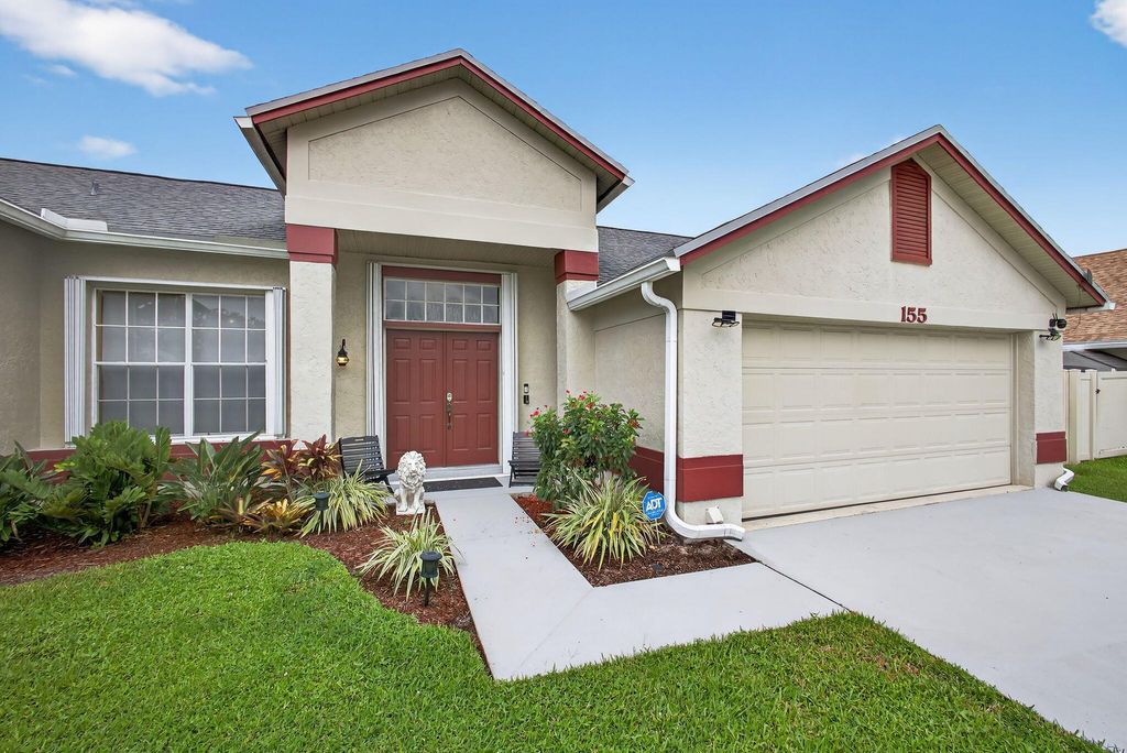 Photo of 155 Royal Pine Circle S, Royal Palm Beach, FL 33411 (MLS # R11117367)