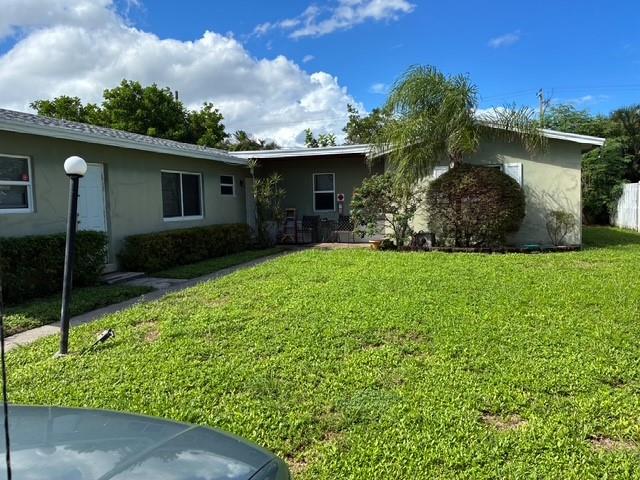 Great location east of US1 in Lighthouse Point. Large 2BR 1BA w/updated kitchen and bathroom, tile floors throughout, high impact windows, newer a/c and in-unit washer/dryer.  Your pet is allowed w/owner's pre-approval & w/deposit but no aggressive breeds. Great local Landlord for tenant peace of mind. This is a non-smoking property.