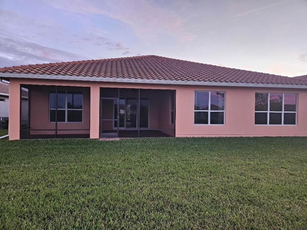 Photo of 12031 SW Marigold Avenue, Port Saint Lucie, FL 34987 (MLS # R11153872)