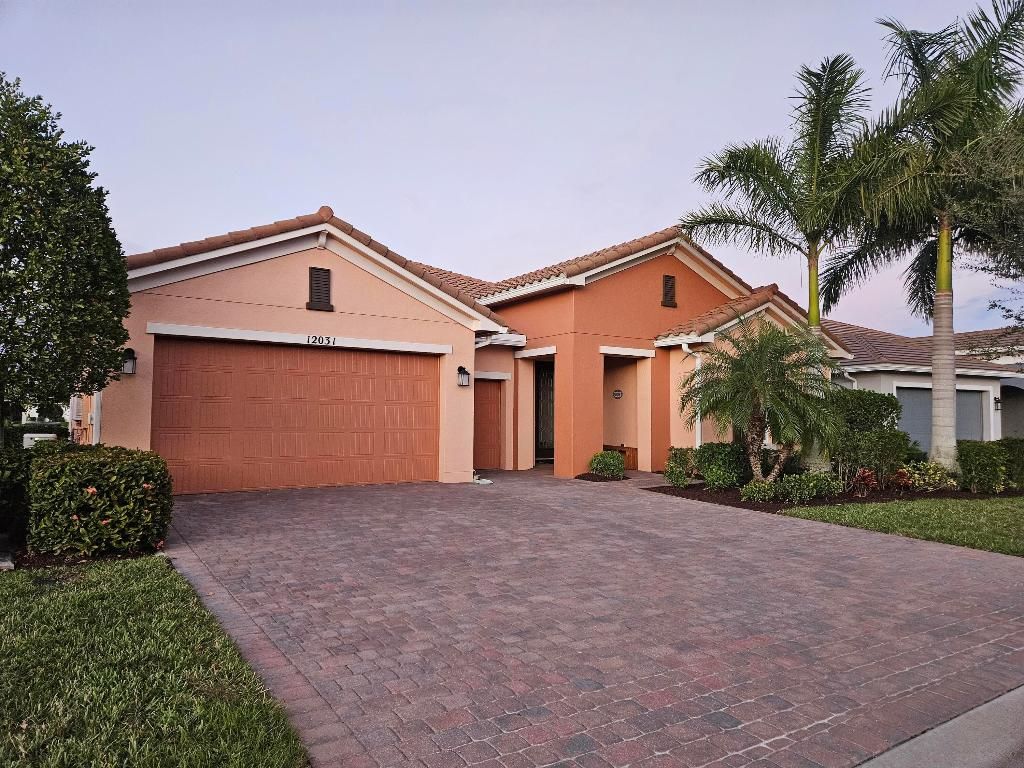 Photo of 12031 SW Marigold Avenue, Port Saint Lucie, FL 34987 (MLS # R11153872)