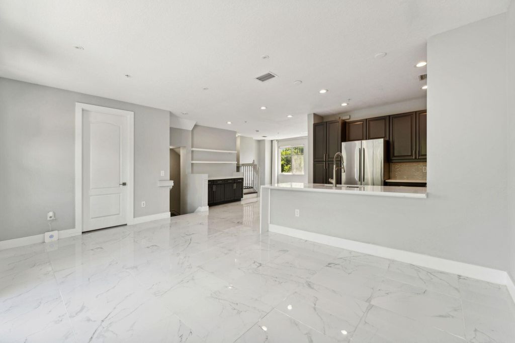 Photo of 671 NW 38th Circle, Boca Raton, FL 33431 (MLS # R11116446)