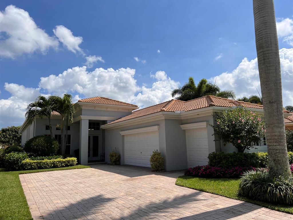 Photo of 147 Orchid Cay Drive, Palm Beach Gardens, FL 33418 (MLS # R10785781)
