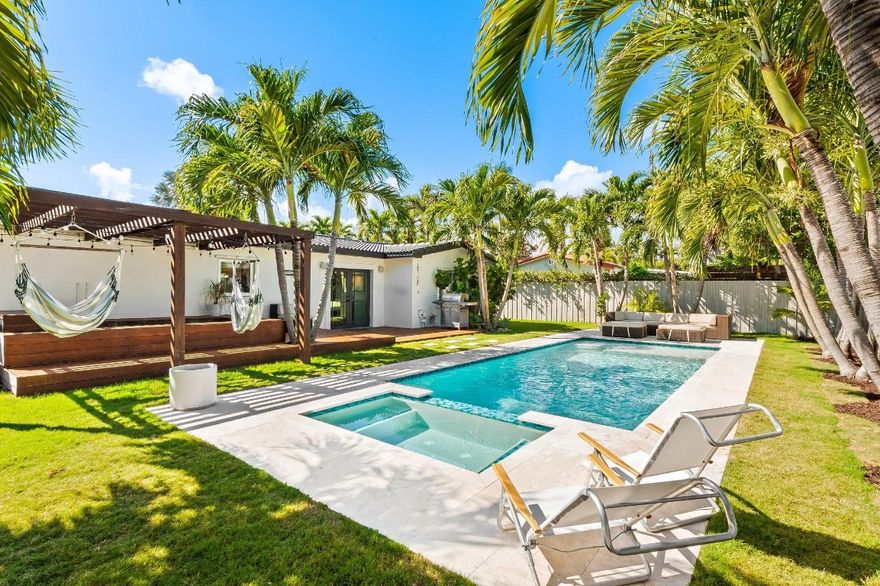 Jump into your brand-new $75,000 swimming pool — by luxury builder Van Kirk & Sons — that transforms this home into an everyday vacation. Ideal for downsizers, first-timers, or part-timers, enjoy a prime location minutes from the beach, dining, and every grocery option imaginable. Brazilian-walnut-style luxury vinyl plank flooring adds rich warmth throughout, while hurricane-impact windows and doors provide peace of mind. This property has been inspected from the roof down to the plumbing, has a receipt 4-Point Report, and is available for a quick close. Plumbing beneath home was updated in 2018. Schedule your tour today.