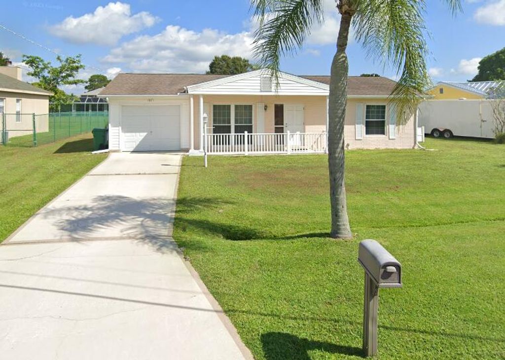 Photo of 1671 SE Goucho Avenue, Port Saint Lucie, FL 34952 (MLS # R10996322)