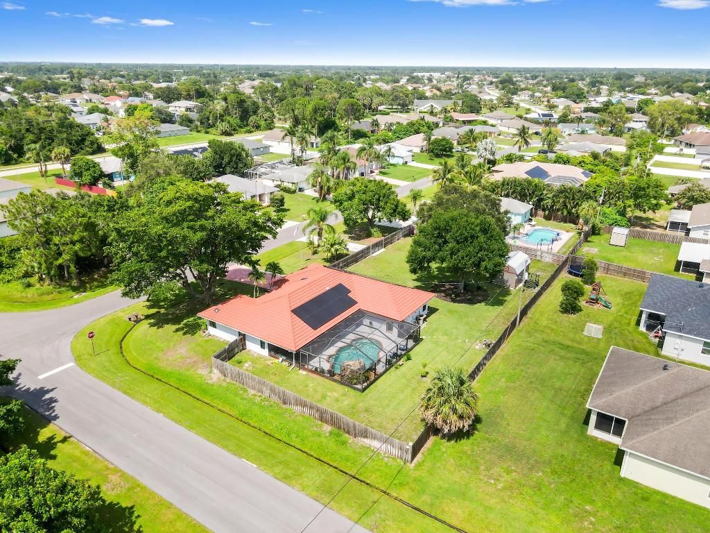 Photo of 1086 SW Goodman Avenue, Port Saint Lucie, FL 34953 (MLS # R11108420)