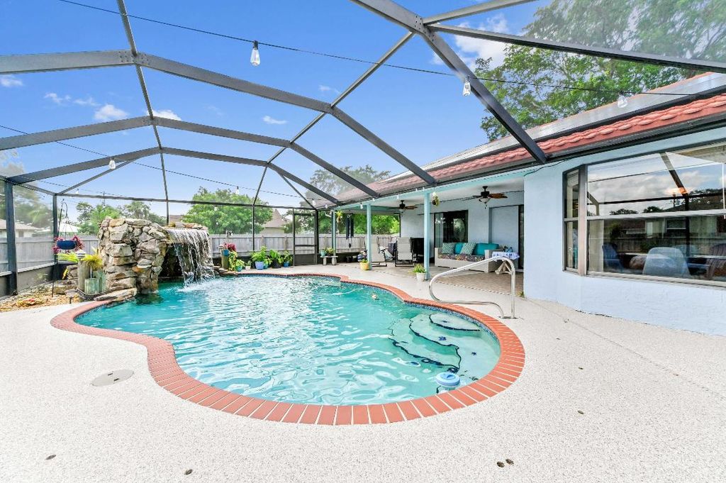 Photo of 1086 SW Goodman Avenue, Port Saint Lucie, FL 34953 (MLS # R11108420)