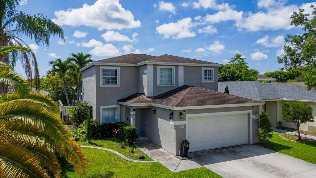 Photo of 1220 SW 46th Ter, Deerfield Beach, FL 33442 (MLS # F10543082)