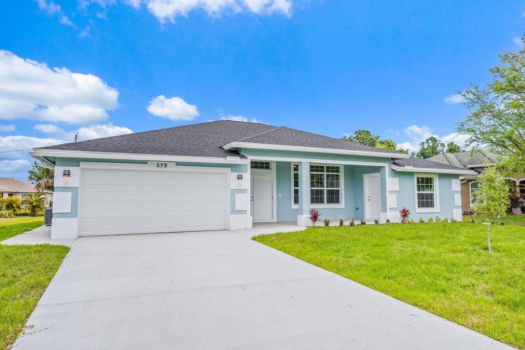 Photo of 579 NW Azine Avenue, Port Saint Lucie, FL 34983 (MLS # R10959512)