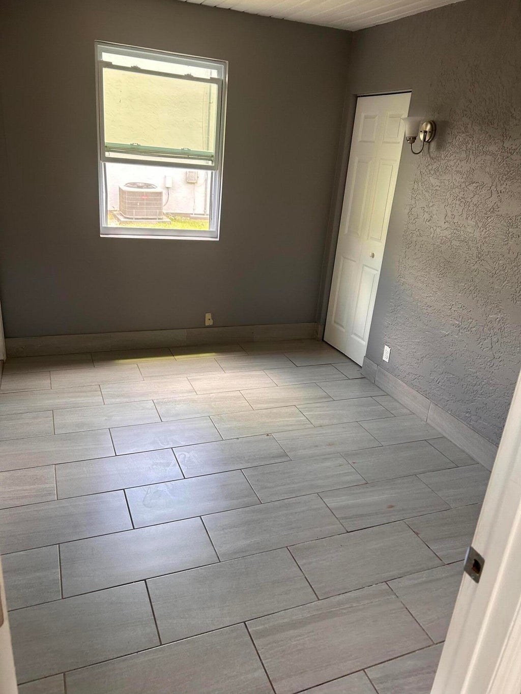 Photo of 2029 SE Hideaway Circle, Port Saint Lucie, FL 34952 (MLS # B26040049)
