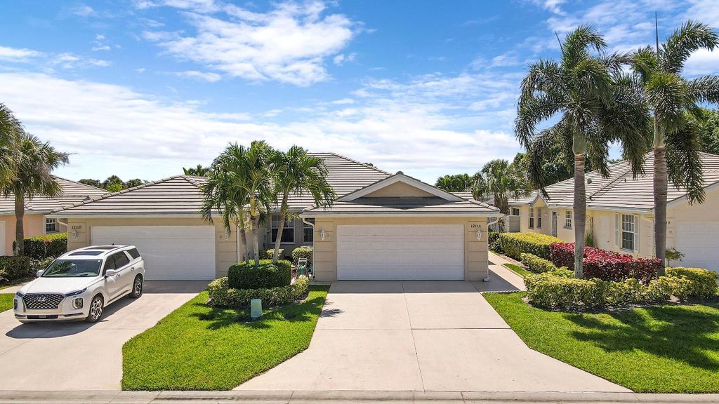 Photo of 1211 NW Bentley Circle #A, Port Saint Lucie, FL 34986 (MLS # R10948737)