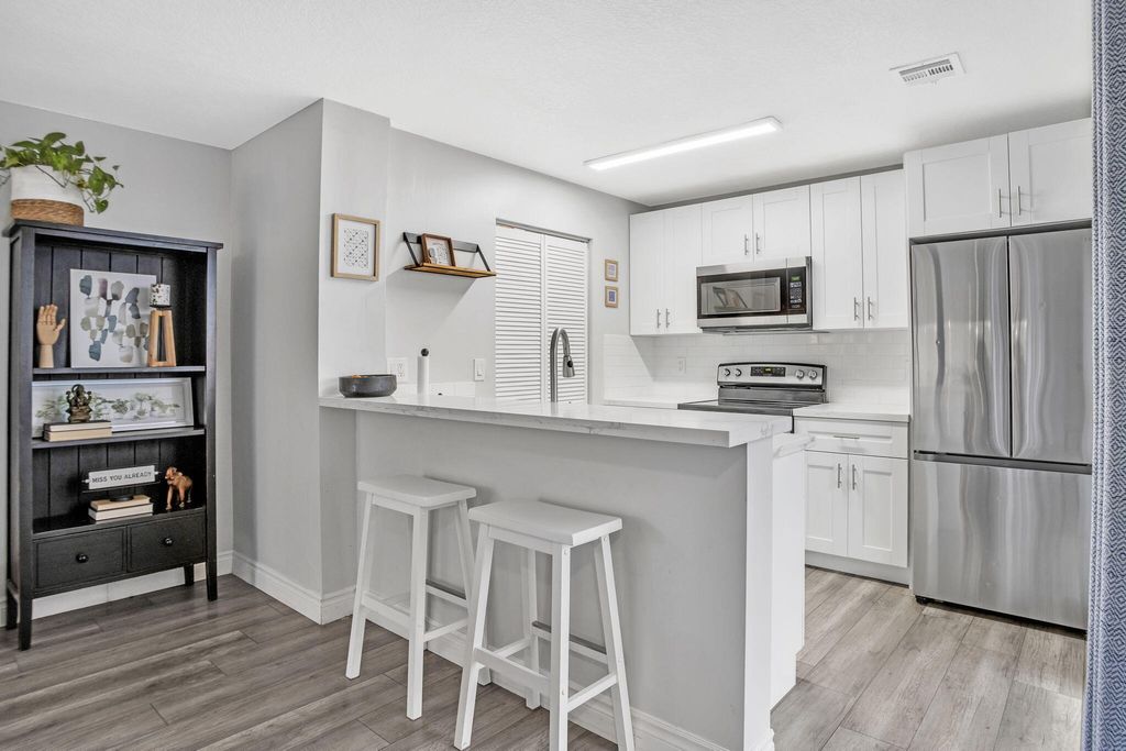 Photo of 8033 NW 71st Court #8033, Tamarac, FL 33321 (MLS # B26013024)