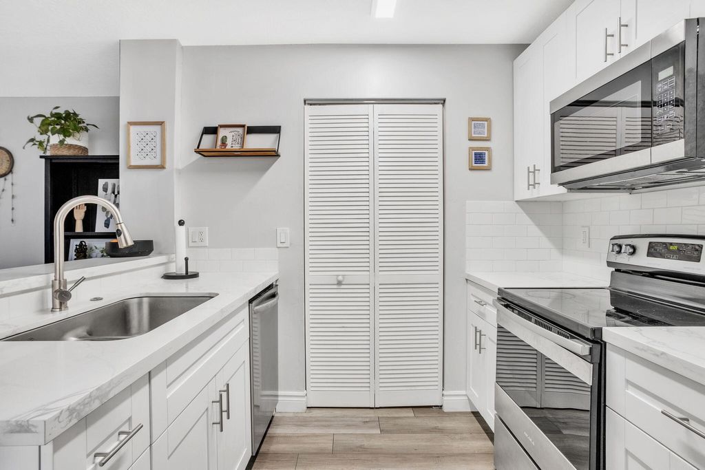 Photo of 8033 NW 71st Court #8033, Tamarac, FL 33321 (MLS # B26013024)