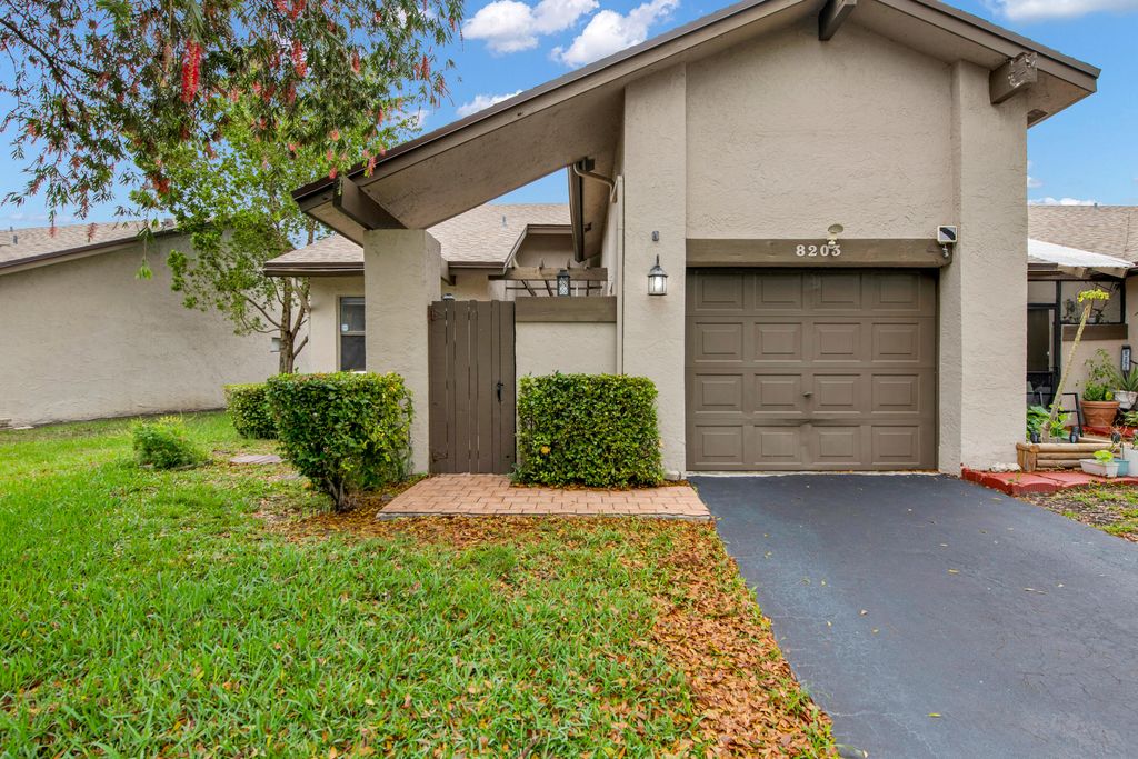 Photo of 8203 NW 100th Way, Tamarac, FL 33321 (MLS # B26014692)