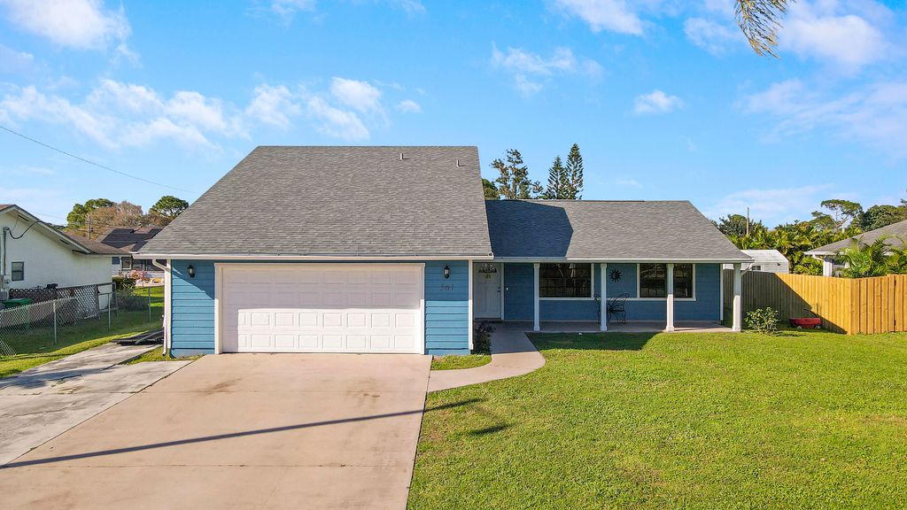 Photo of 561 SE Ron Rico Terrace, Port Saint Lucie, FL 34983 (MLS # R10873415)