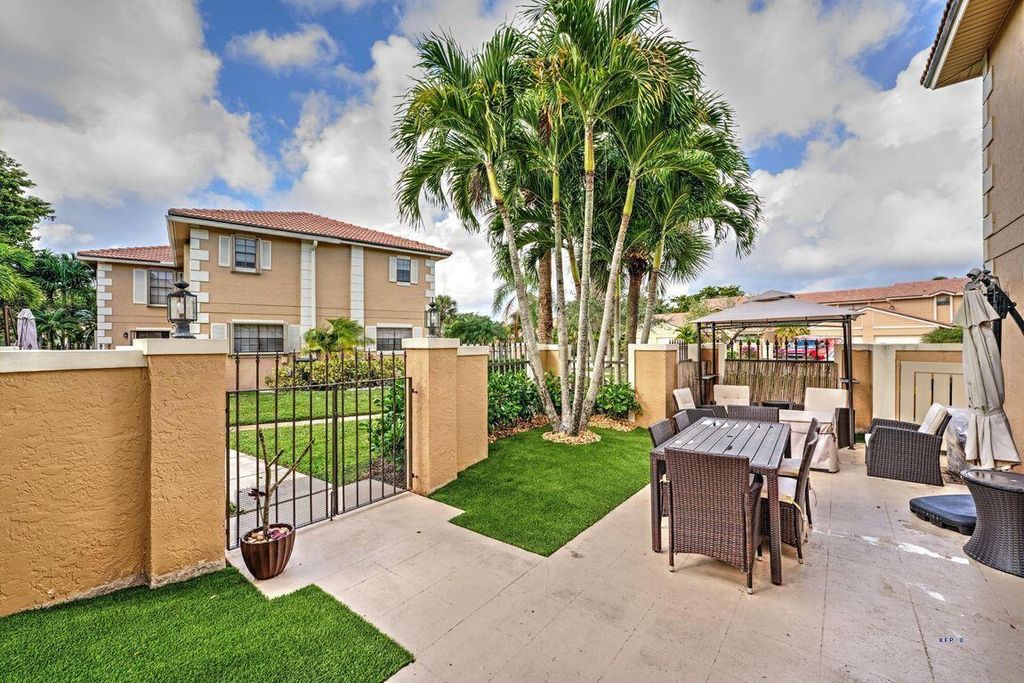 Photo of 390 Prestwick Circle #4, Palm Beach Gardens, FL 33418 (MLS # R10946897)