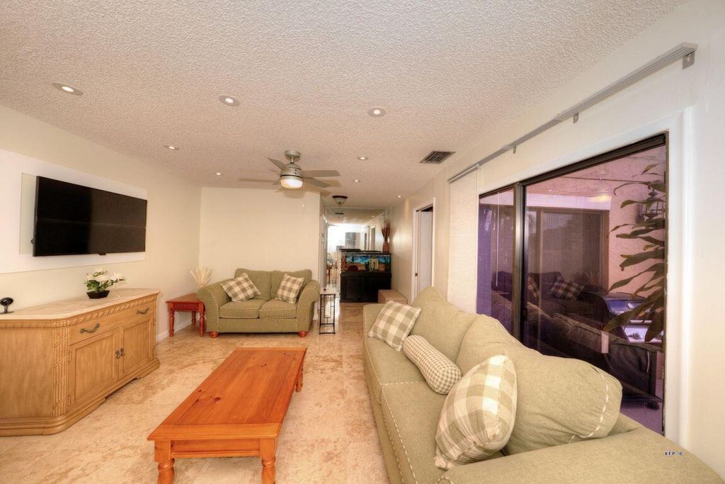 Photo of 390 Prestwick Circle #4, Palm Beach Gardens, FL 33418 (MLS # R10946897)