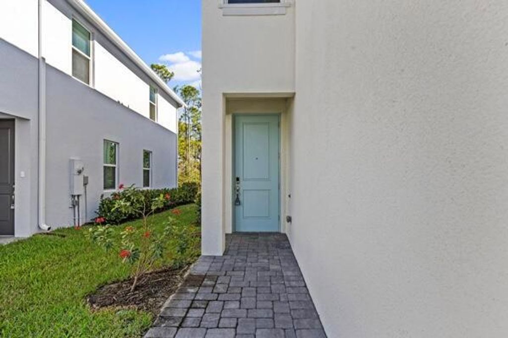 Photo of 238 Osprey Preserve Boulevard, Jensen Beach, FL 34957 (MLS # R11042307)