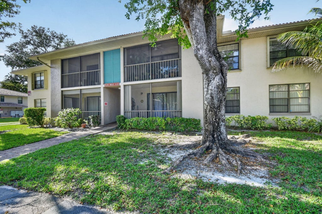Photo of 9810 Pineapple Tree Drive #103, Boynton Beach, FL 33436 (MLS # B26046303)