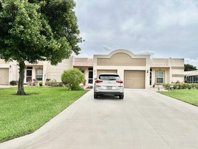 2/2 Magnificent Villa with long driveway, Bath patio with magnificent lake view,eat in kitchen,tile in living area,light and bright. Short walk to active clubhouse with heated pool, tennis and bocce courts, game and exercise rooms,etc.. Close to shopping,restaurants,and entertainment. This magnificent home is a must see !!!