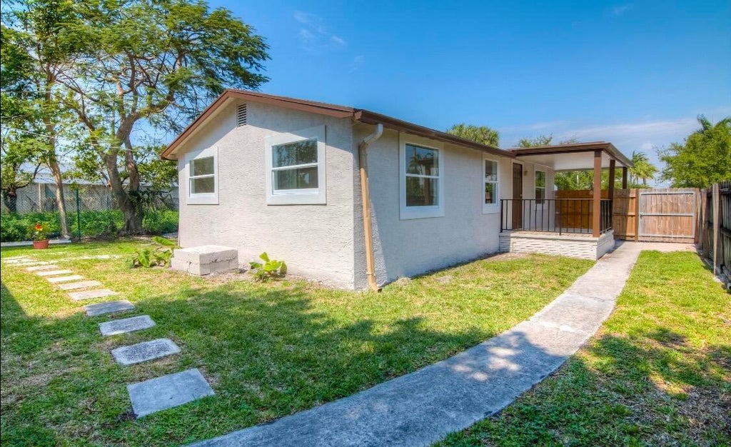Photo of 2960 CHICKAMAUGA Avenue, West Palm Beach, FL 33409 (MLS # B26067776)