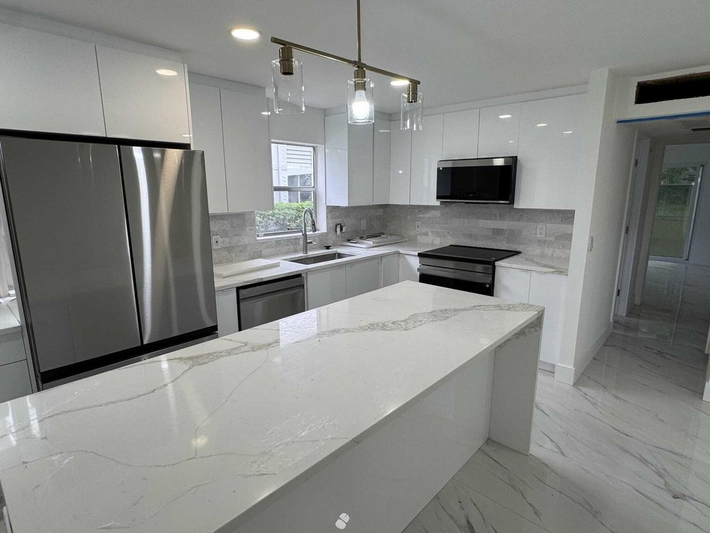 Photo of 216 Tuscany #D, Delray Beach, FL 33446 (MLS # B26027343)