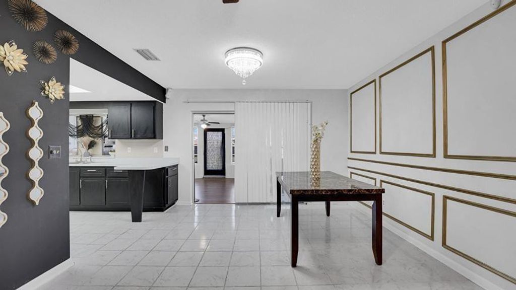 Photo of 223 E Arbor Avenue, Port Saint Lucie, FL 34952 (MLS # F10523789)