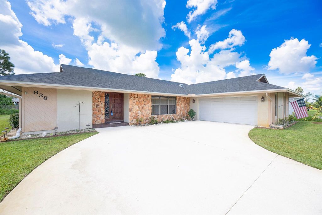 Photo of 638 SE Walters Terrace, Port St Lucie, FL 34983 (MLS # R10908663)