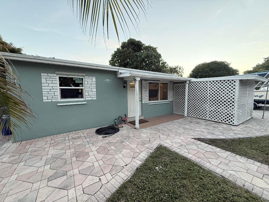 Welcome to a great home in a really friendly neighborhood in Collier Manor just minutes from US1 and everything Pompano Beach has to offer.
This is a spacious 3 bedroom 2 bathroom home with a bonus room that can easily be used as a home office, nursery, den, or flex space to fit your needs.
The home features a newer roof, an AC from 2017, freshly painted interior, a newly updated bathroom, and brand new impact doors and windows installed in 2025. There is a large paver driveway with room for up to eight cars, which is a huge plus. The backyard offers mature fruit trees and plenty of space to relax or entertain.
The location is a major highlight. You are only about a six minute drive to the beach and close to shopping, dining, parks, and major roadways. The area is served by good