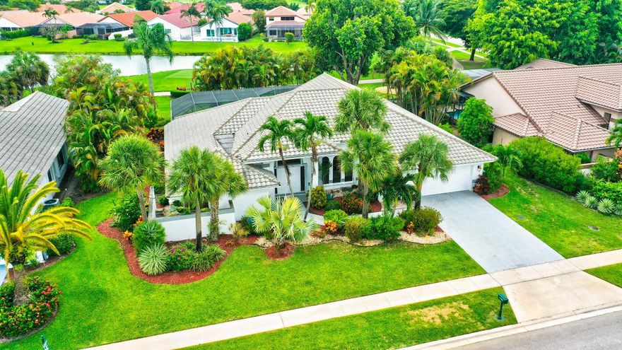 DO NOT MISS THIS AWESOME RENOVATION IN BOCA WOODS COUNTRY CLUB!!  THE CORINTHIAN MODEL HOME WAS MODIFIED TO MAKE AN OPEN FLOOR PLAN AND ALSO TO INCLUDE A 4TH BEDROOM.  ALL BEDROOMS ARE ENSUITE!!
HUGE GREAT ROOM WITH HIGH CEILINGS IS OPEN TO CHERRY & GRANITE CENTER
KITCHEN WITH LED UNDER CABINET LIGHTING & PLENTY OF SPACE TO PREPARE & STORE! LARGE TILE FLOORS, LIGHT AND BRIGHT FINISHES, ACCESS TO FULL BATH FROM LARGE SCREENED TRAVERTINE POOL, PATIO.  LUXURIOUS MASTER BEDROOM SUITE WITH LARGE WALK-IN CLOSET + 2nd CLOSET & MASTER BATH WITH FREE STANDING TUB, OVERSIZED SHOWER.  A MUST TO SEE IN BOCA WOODS. GOLF EQUITY MUST BE PURCHASED - $75,000 TEN (10) DAYS PRIOR TO CLOSING.  $20,000 REFUNDABLE WHEN YOU SELL YOUR HOME. DUES $17,430+TAX A YEAR - MINIMUM IN THE DINING ROOM $1,000+TAX A YEAR -
$107 PER MONTH AS THERE IS NO TIPPING - $84 A MONTH FOR
ENHANCEMENT OF THE CLUBHOUSE. 2 CHAMPIONSHIP GOLF COURES -PUTTING GREEN, DRIVING RANGE - TENNIS - PICKLE BALL - BOCCE BALL - LARGE CARD ROOMS, PROFESSIONAL ENTERTAINMENT -
NEW FITNESS CENTER WITH TRAINERS AVAILABLE - SAUNA - STEAM ROOM - HAIR AND NAIL SALON AND SO MUCH MORE.
THE PERFECT HOME FOR A DISCRIMINATING BUYER.