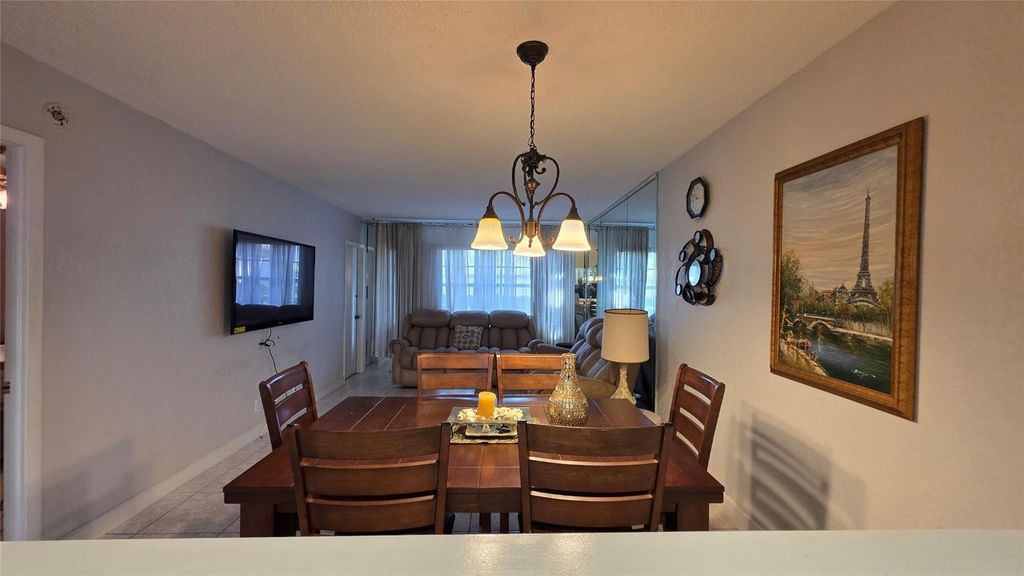 Photo of 5111 W Oakland Park Boulevard #104, Lauderdale Lakes, FL 33313 (MLS # F10548260)