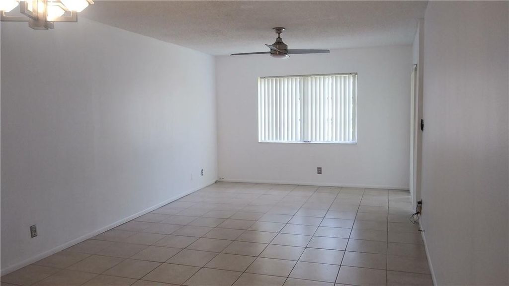 Photo of 6501 Winfield Boulevard #A-48, Margate, FL 33063 (MLS # B26003351)