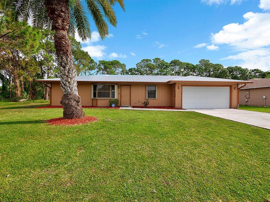 Don't miss this 2 Bedroom 2 Bathroom Pool/Hot Tub Home with 2 Car Garage located in a great neighborhood. Home has a NEW Metal Roof, NEW A/C, both replaced within the last year. Home has Alarm system with 2 cameras. Outside of home was painted within the last 2 years. Pool and Hot Tub are covered by large screen enclosure. Location of the home at the end of the street results in little traffic and very little noise. This pool home is a unique find in St Lucie.