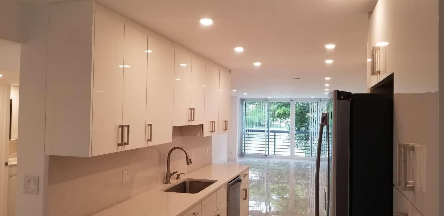 Beautiful renovated condo in Wynmoor. Brand new kitchen and bathrooms. Wood Look porcelain floors throughout, Hurricane glass enclosed patio for additional living space, LED recessed lighting, Walk in Closets in both bedrooms. Zero entry walk in showers in both bathrooms, Washer/Dryer hookup in unit!!!