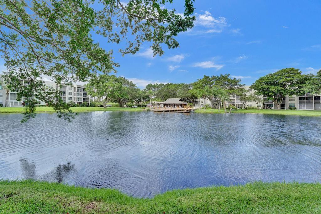 SERENE WATER & GOLF VIEWS FROM SCREENED PATIO * UPDATED KITCHEN WITH GRANITE COUNTER TOPS * GRANITE VANITY TOP * APARTMENT WAS COMPLETELY REMODELED TOP TO BOTTOM IN 2015. NEW KITCHEN APPLIANCES IN 2022 * NEW AIR HANDLER AND HOT WATER HEATER 2023 * STEPS TO THE UTILITY ROOM. OWNER OFFERING $5000 FOR INTEREST RATE BUYDOWN TO MAKE FINANCED OFFER MORE AFFORDABLE OR $5,000 CONCESSIONS FOR CASH BUYER. FURNITURE AVAILABLE* WITH NICE FURNITURE JUST BRING TOOTHBRUSH * LAUNDRY ROOM NEAR UNIT ON SAME FLOOR*JUST MINUTES FROM TOP COLLEGES AND UNIVERSITIES. TOP COMMUNITY AMENITIES, INCLUDING GOLF, TENNIS, AND A COUNTRY CLUB CLUBHOUSE, ALL WITHIN A PEACEFUL, SECURE ENVIRONMENT. PERFECT FOR STUDENTS * PROFESSIONALS*