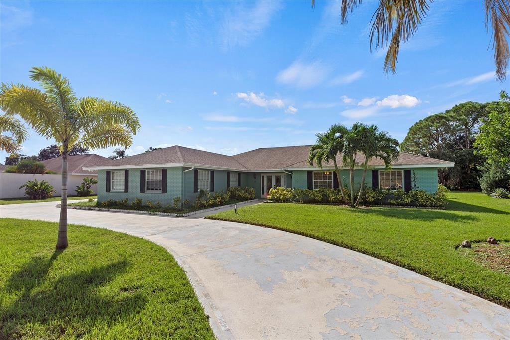 Photo of 1862 SE Boma Avenue, Port Saint Lucie, FL 34952 (MLS # F10415835)