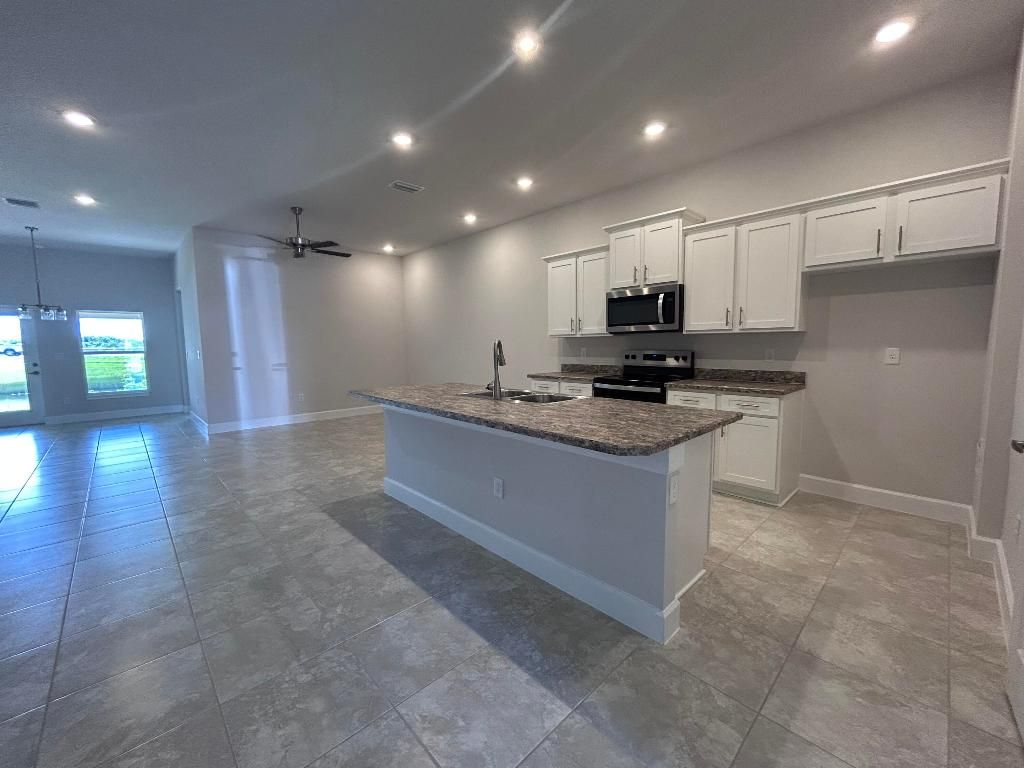 Photo of 5115 Modeno Street, Fort Pierce, FL 34951 (MLS # R11120132)