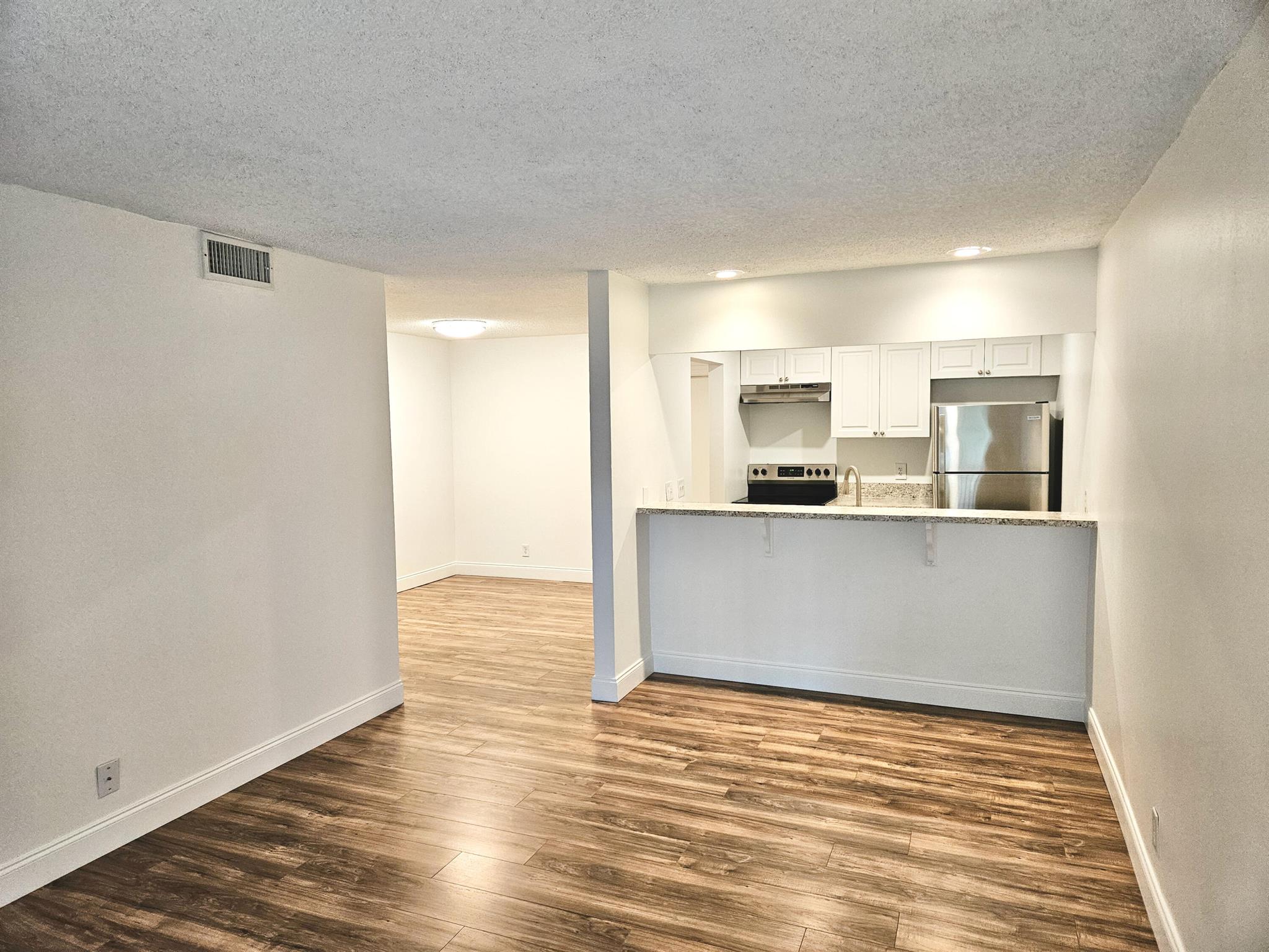 Beautifully Updated 1-Bedroom Condo in the Heart of Boca RatonWelcome to this charming first-floor 1-bedroom condo located in a well-maintained, all-ages community in the heart of Boca Raton. Ideally situated right by Florida Atlantic University (FAU) and Boca Raton Regional Hospital - this unit is perfect for students, medical professionals, or anyone seeking convenience and a vibrant lifestyle.Enjoy easy access to the beach, Mizner Park, shopping, dining, and I-95--all just minutes away. The condo features a private patio, community pool, and an assigned parking spot. Freshly updated and move-in ready, this is a fantastic opportunity to own in one of Boca Raton's most desirable locations. Schedule a showing today!