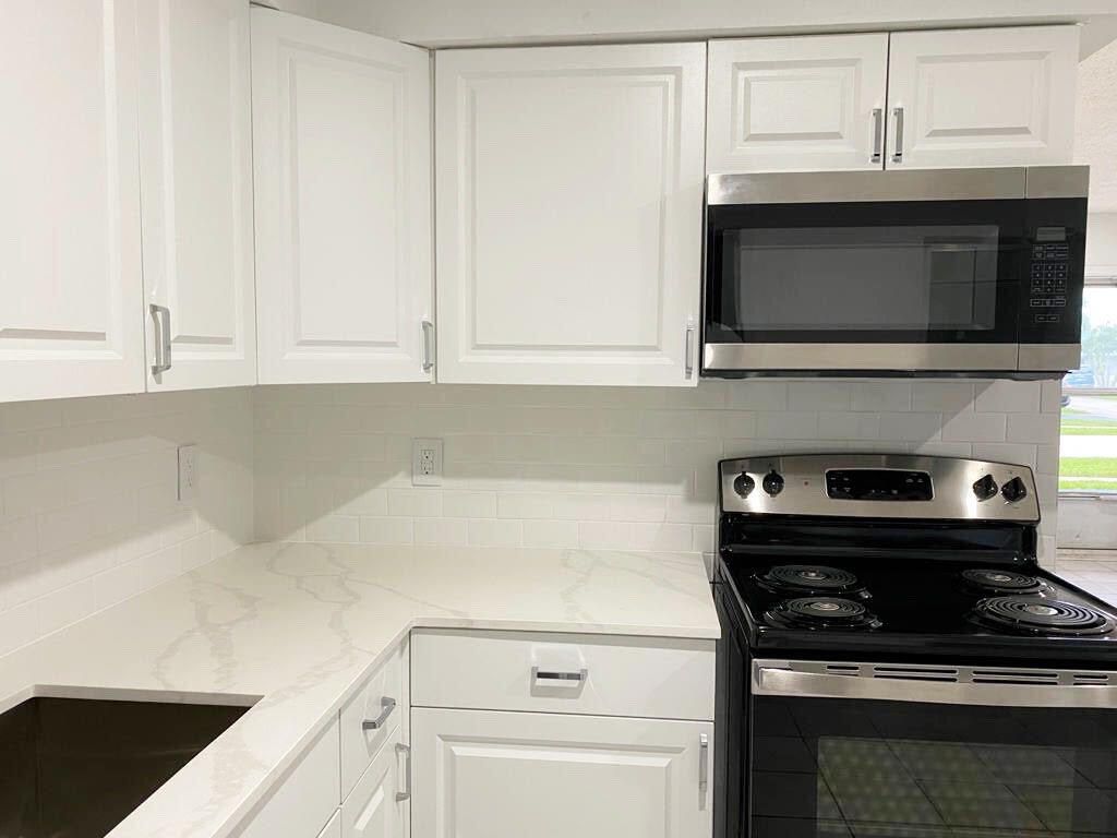 Photo of 2715 Ponce De Leon Boulevard, Delray Beach, FL 33445 (MLS # R11149703)