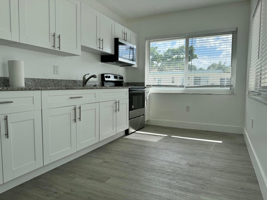 Photo of 1833 Madison Street, Hollywood, FL 33020 (MLS # B26069389)