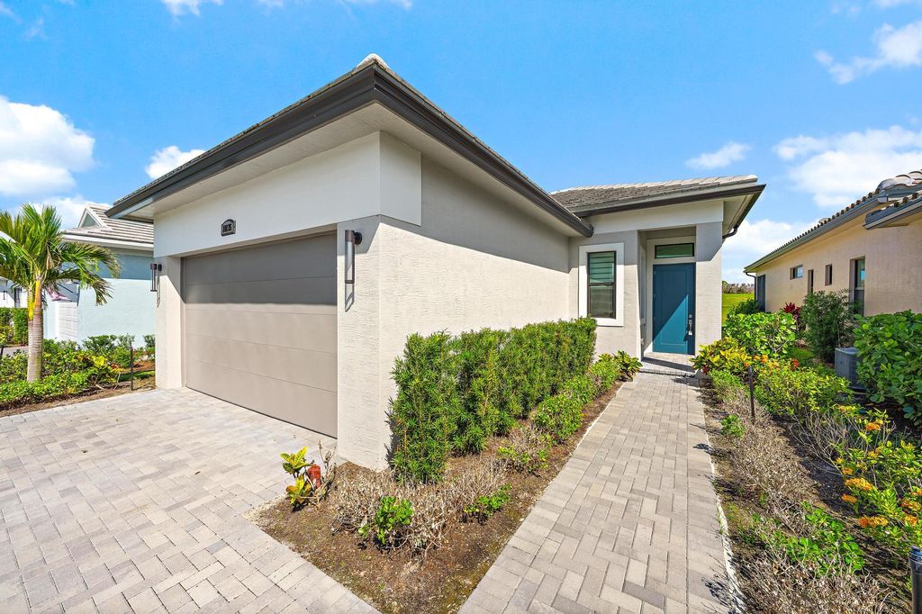 Photo of 10135 SW Latium Way, Port Saint Lucie, FL 34987 (MLS # B26032367)