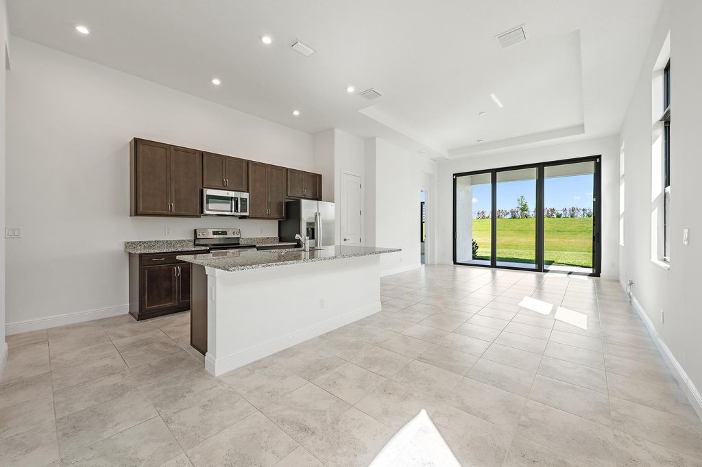 Photo of 10135 SW Latium Way, Port Saint Lucie, FL 34987 (MLS # B26032367)