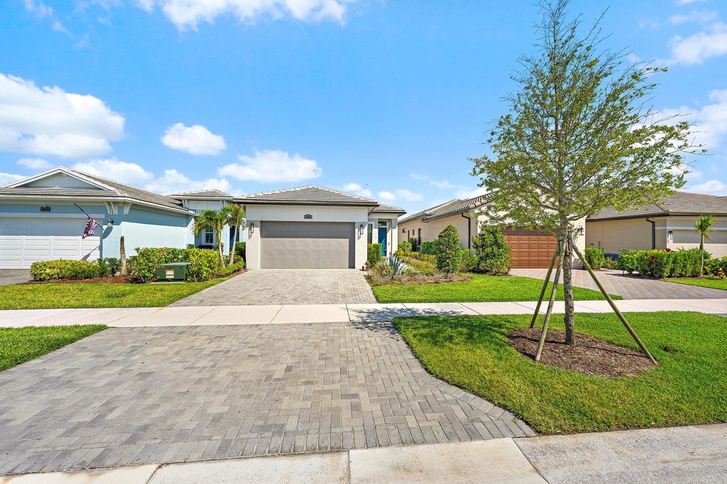 Photo of 10135 SW Latium Way, Port Saint Lucie, FL 34987 (MLS # B26032367)