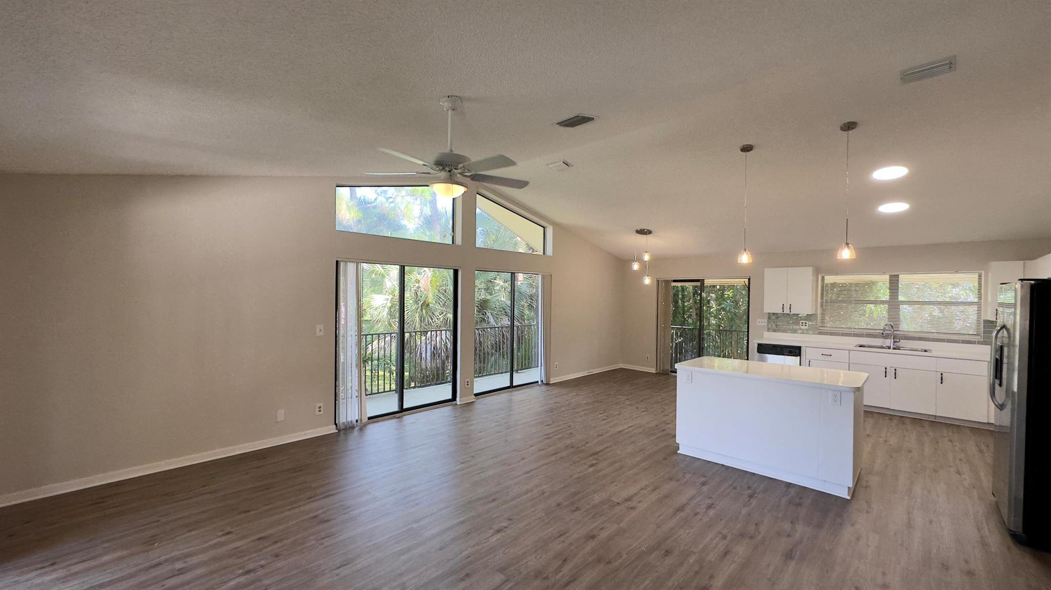 CENTRALLY LOCATED ACREAGE SINGLE FAMILY HOME IN THE GATED COMMUNITY OF RIVER BRIDGE OFFERING PLENTY OF PRIVACY ON OVER AN ACRE OF LAND! 2210 SQ FT SECOND FLOOR OFFERS THREE BEDROOMS, TWO BATHS, OPEN CONCEPT LIVINGROOM - KITCHEN FEATURING WHITE CABINETRY, STAINLESS APPLIANCES, SUBWAY TILE BACKSPLASH AND VAULTED CEILINGS. MASTER ENSUITE FEATURES VAULTED CEILINGS, WALK IN CLOSET, UPDATED BATHROOM WITH DUAL SINKS AND WALK IN SHOWER. GUEST BATH FEATURES DUAL SINKS AND SHOWER/TUB COMBINATION. VINYL FLOORING THROUGHOUT. LOWER LEVEL FEATURES A MOTHER IN LAW SUITE WITH ONE BEDROOM, ONE BATH AND KITCHEN WITH STAINLESS APPLIANCES AND TILE FLOORING THROUGHOUT. PRIVATE YARD PERFECT FOR ENTERTAINING! LARGE DRIVEWAY WITH AN OVERSIZED DETACHED THREE CAR GARAGE. PRIVACY, LOCATION AND SPACE!