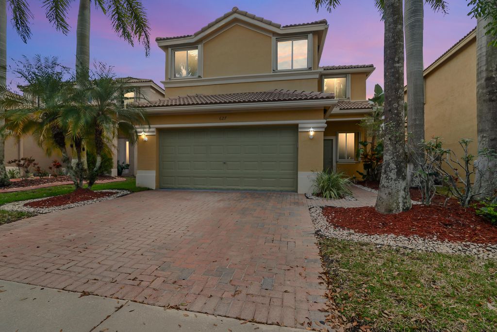Photo of 627 Conservation Drive, Weston, FL 33327 (MLS # B26016069)